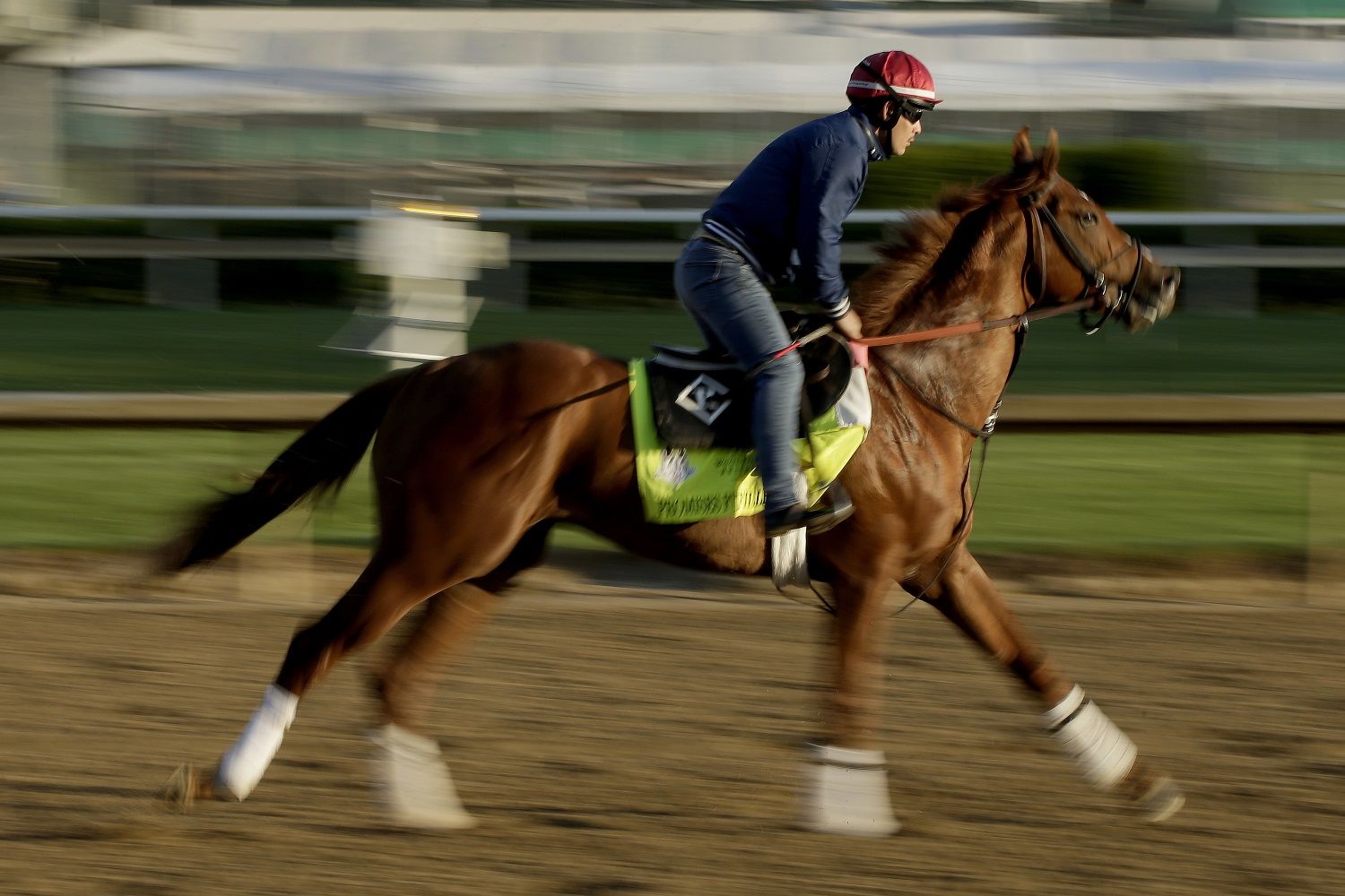 Kentucky Derby hopeful Promises Fulfilled runs during a morning workout at Churchill Downs Tuesday, May 1, 2018, in Louisville, Ky. The 144th running of the Kentucky Derby is scheduled for Saturday, May 5. (AP Photo/Charlie Riedel)