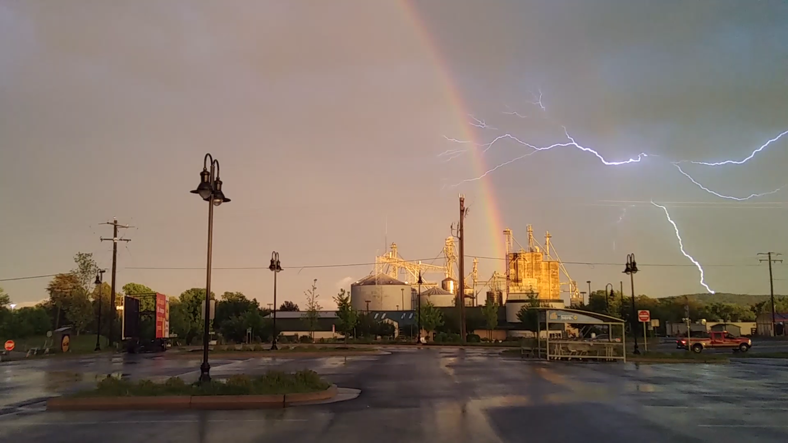 A rainbow and a bolt of lightning share the sky over Culpeper, Virginia. (Courtesy Todd Durica)