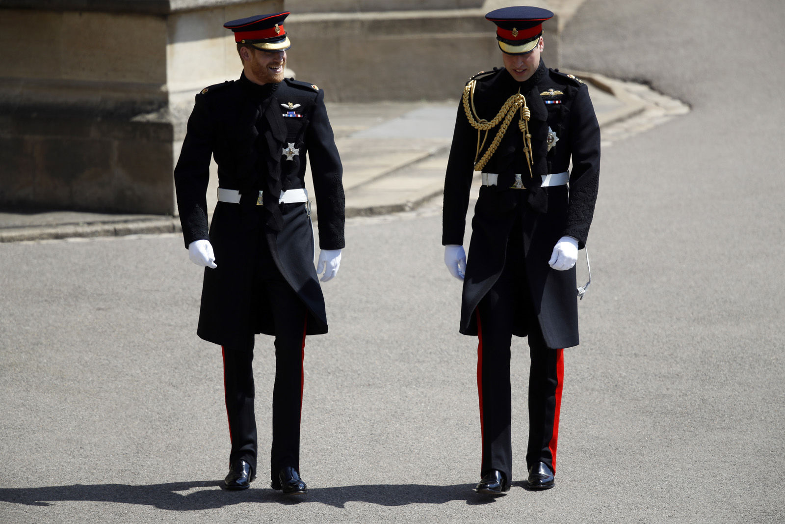 Britain's Prince Harry, left, and best man Prince William arrive for the wedding ceremony at St. George's Chapel in Windsor Castle in Windsor, near London, England, Saturday, May 19, 2018. (Odd Anderson/pool photo via AP)
