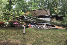 While their garage was destroyed, Laura said their home was spared from most of the damage. She said the only casuality was their "good beer," forcing she and her husband to drink whiskey instead. (WTOP/Neal Augenstein)