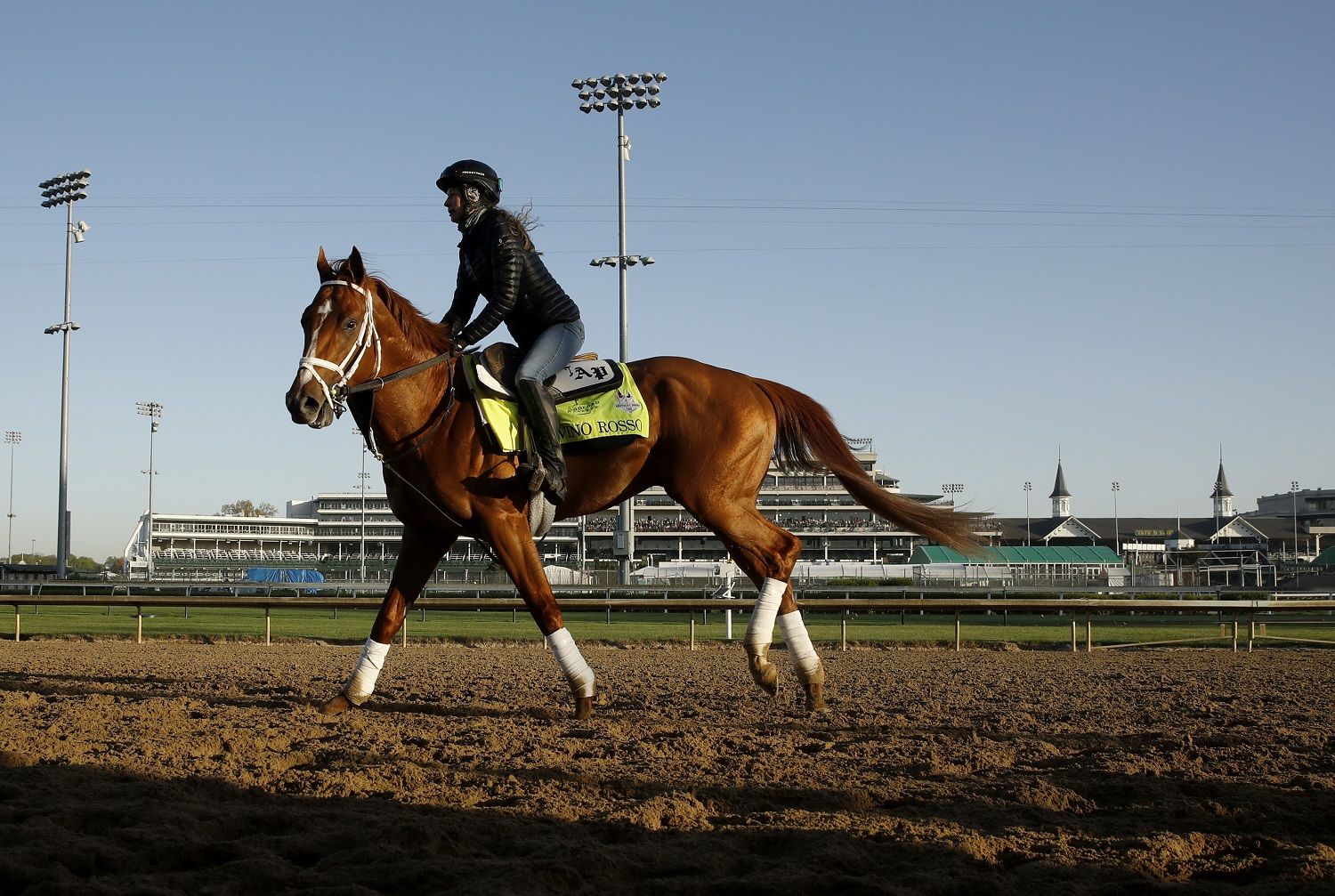 Kentucky Derby hopeful Vino Rosso runs during a morning workout at Churchill Downs Tuesday, May 1, 2018, in Louisville, Ky. The 144th running of the Kentucky Derby is scheduled for Saturday, May 5. (AP Photo/Charlie Riedel)