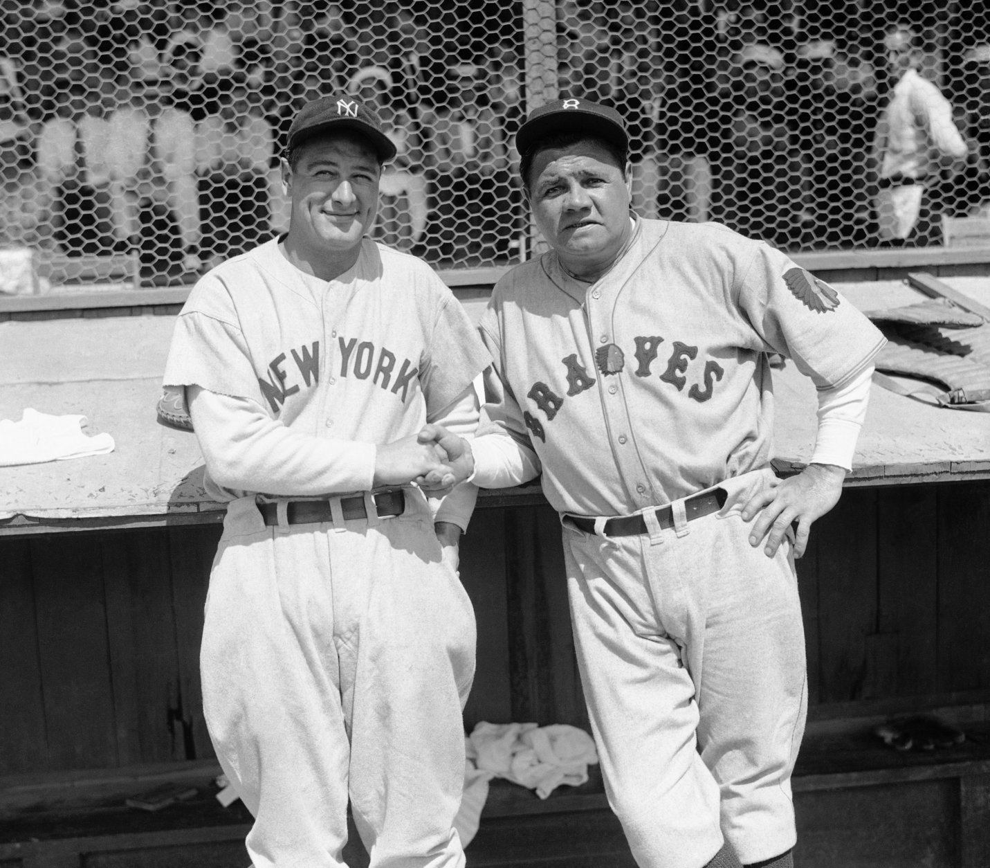 Former New York Yankees teammates Babe Ruth, right, and Lou Gehrig pose together at a spring training game in St. Petersburg, Fla., March 16, 1935 as they met for the first time after Ruth left the Yankees for the Boston Braves.  The Braves defeated the Yankees 3-2 in the exhibition game. (AP Photo/Tom Sande)