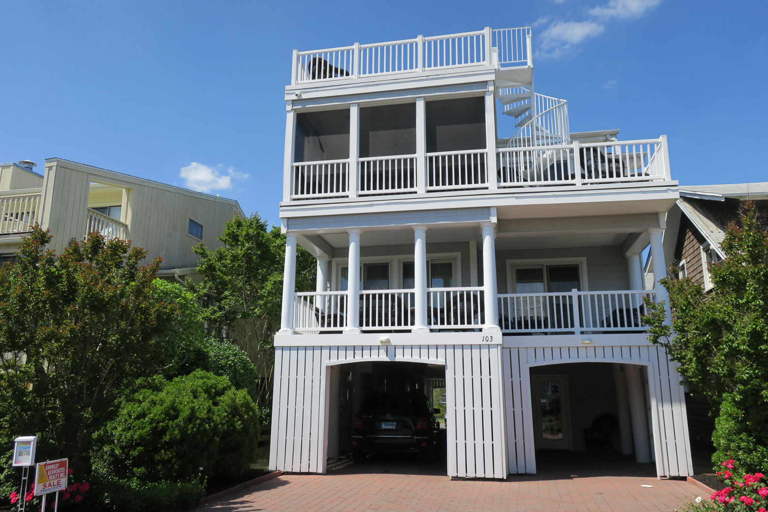 Photo shows a Bethany Beach home with a spiral staircase