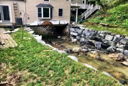 Some homes in Ellicott City are built over waterways. This home on Main Street has the Tiber Creek flowing beneath it. (WTOP/Neal Augenstein)