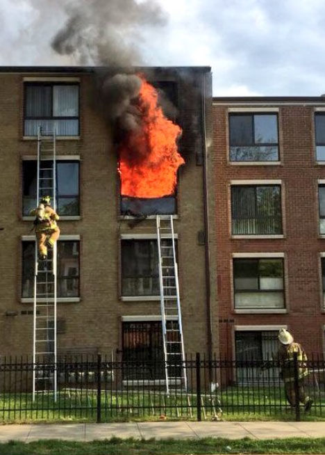 A fire rages on the second floor of a Southeast D.C. apartment building on Friday, May 4, 2018. (Courtesy DC. Fire and EMS)