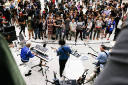 Jack White plays a surprise concert for D.C.'s Woodrow Wilson High School on Wednesday. (David James Swanson)