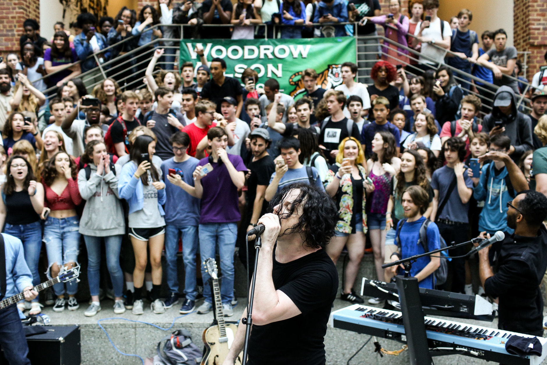 Jack White plays a surprise concert for D.C.'s Woodrow Wilson High School on Wednesday. (David James Swanson)