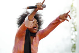 Macy Gray performs at a free concert in New York's Battery Park as part of the 2004 Tribeca Film Festival, Saturday night May 8, 2004. (AP Photo/Stuart Ramson)