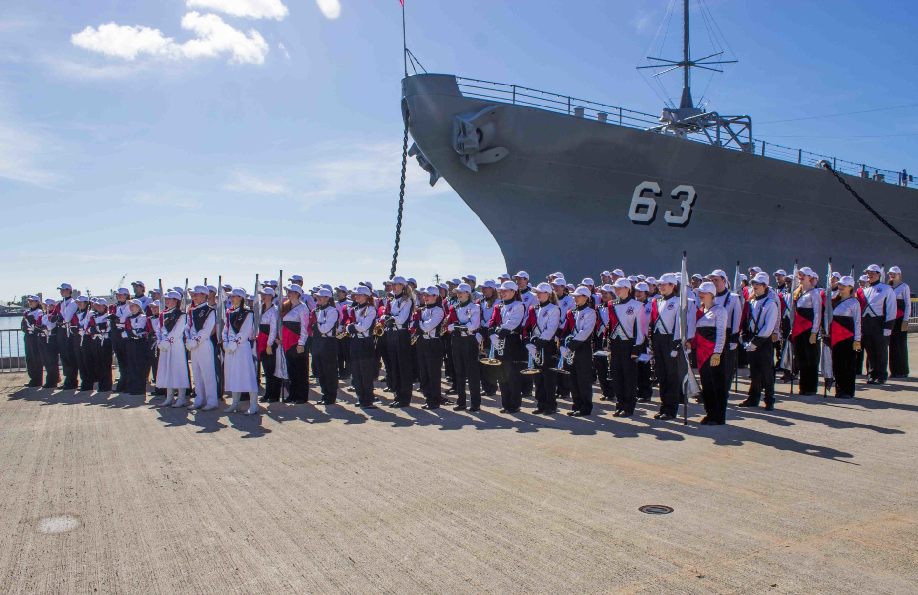 Picture of the band with the USS Missouri, taken during the 2013 visit to Honolulu, Hawaii, when it participated in the Pearl Harbor Memorial Parade. (Courtesy Bruce Friedman) 