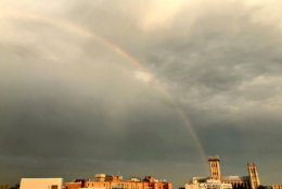 A rainbow appears over D.C. after a storm on Thursday, May 10, 2018. (WTOP/Dave Dildine)
