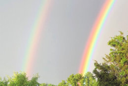 After the storms passed. a double rainbow formed. (Courtesy Erik Johnson via Twitter)