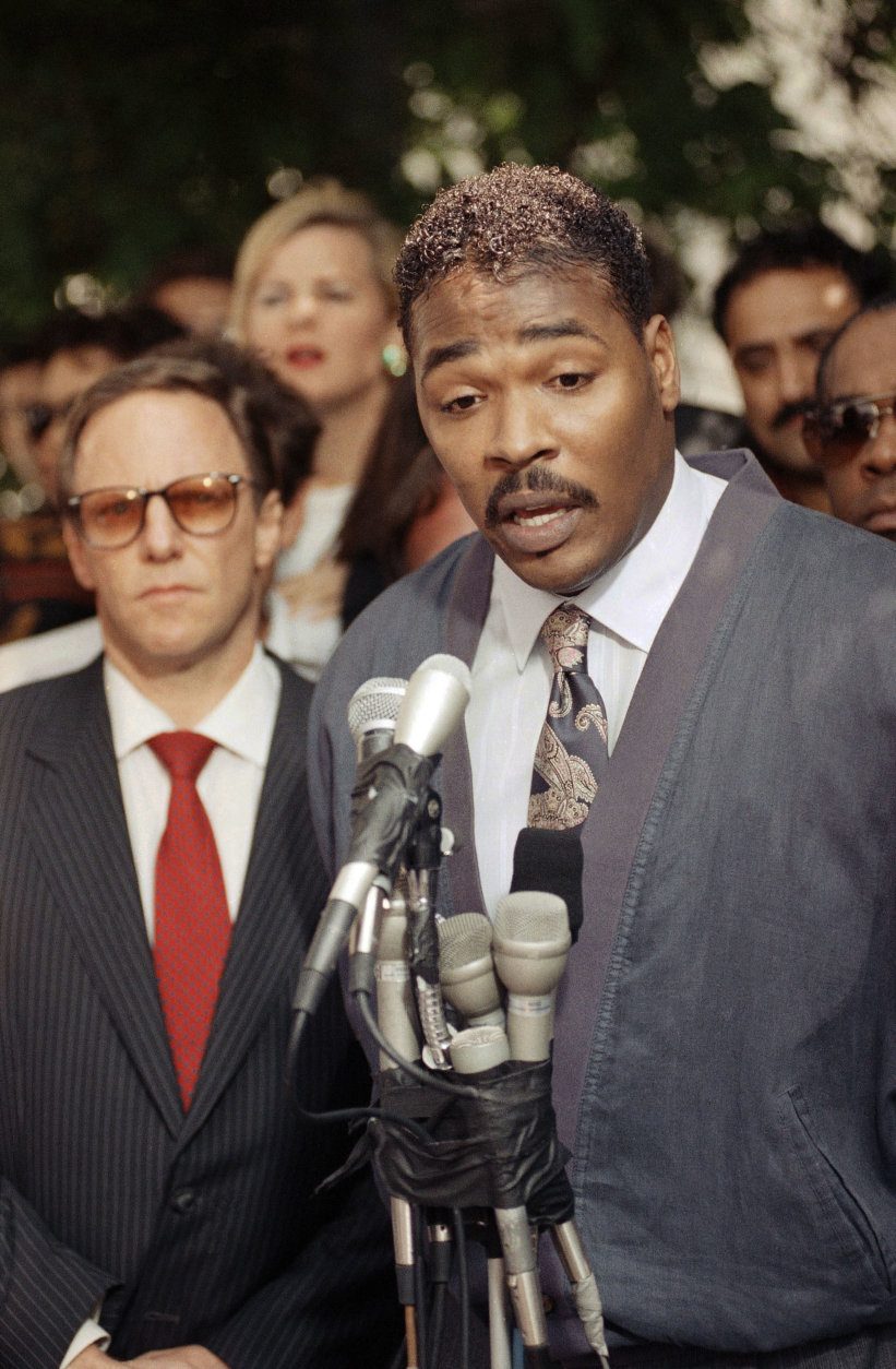 FILE -  This May 1, 1992 file photo shows Rodney King, right, speaking during a news conference in Los Angeles along with his attorney, Steven Lerman, left. King, the black motorist whose 1991 videotaped beating by Los Angeles police officers was the touchstone for one of the most destructive race riots in the nation's history, has died, his publicist said Sunday, June 17, 2012. He was 47. (AP Photo/David Longstreath, file)