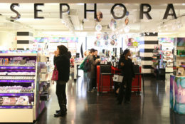 In this Friday, Oct. 23, 2009 photo, shoppers  visit a Sephora boutique inside a J.C. Penney store in New York. (AP Photo/Mark Lennihan)