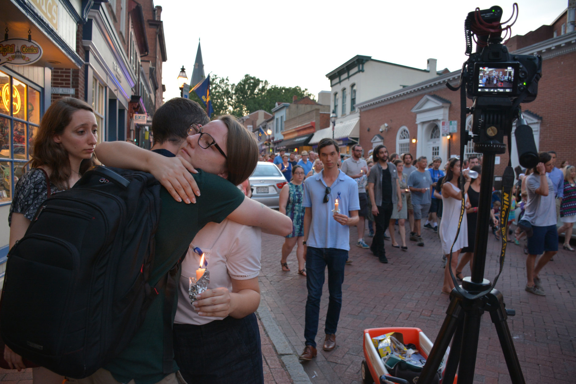 Baltimore Sun videographer Ulysses Muñoz gives a hug during a Friday night vigil in downtown Annapolis for victims killed in a shooting at the Capital Gazette in Annapolis, Maryland. (Courtesy/Bethany Swain)