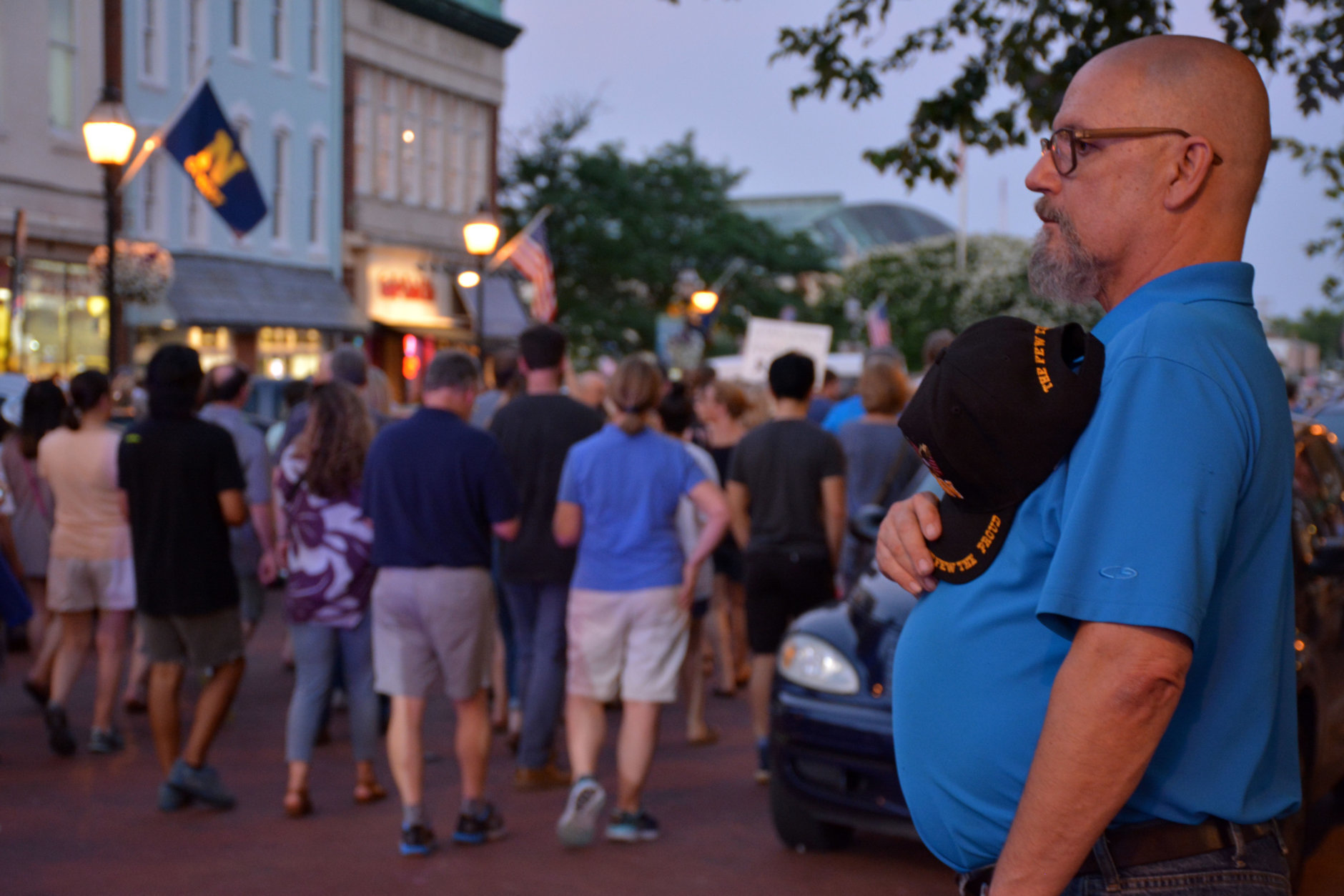 Supporters hold signs Friday night at a candlelight vigil in downtown Annapolis for victims murdered in a shooting at the Capital Gazette in Annapolis, Maryland. (Courtesy/Bethany Swain)