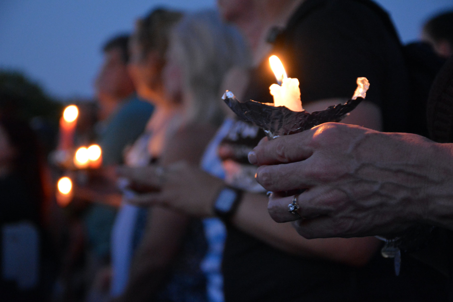 Supporters hold candles Friday night at a vigil in downtown Annapolis for victims murdered in a shooting at the Capital Gazette in Annapolis, Maryland. (Courtesy/Bethany Swain)