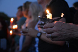 Supporters hold candles Friday night at a vigil in downtown Annapolis for victims murdered in a shooting at the Capital Gazette in Annapolis, Maryland. (Courtesy/Bethany Swain)