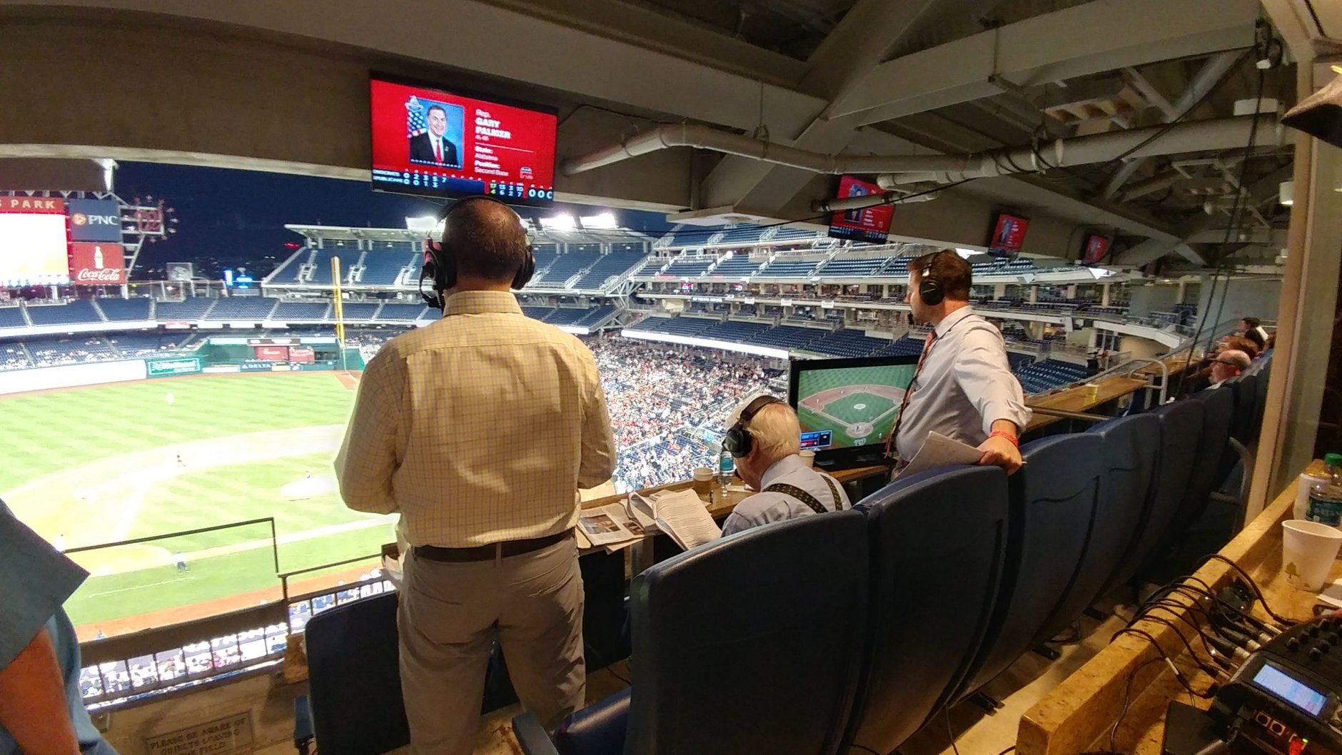WTOP's George Wallace, Dave McConnell and Noah Frank call the Congressional Baseball Game on Thursday, June 14, 2018. (WFED/Lauren Larson)