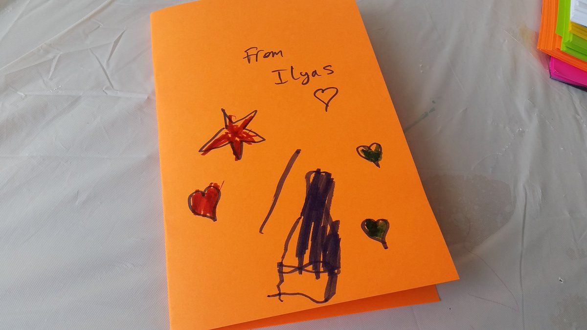 This photo shows one child's welcome card for refugees. (WTOP/Kathy Stewart)