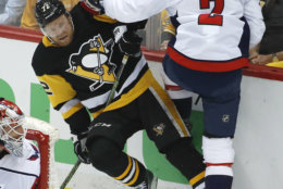 Washington Capitals' Matt Niskanen (2) collides with Pittsburgh Penguins' Patric Hornqvist (72) during the first period in Game 4 of an NHL second-round hockey playoff series in Pittsburgh, Thursday, May 3, 2018. (AP Photo/Gene J. Puskar)
