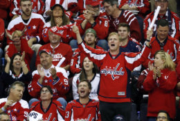 Washington Capitals fans cheer during the second period in Game 4 of the NHL hockey Stanley Cup Final between the Capitals and the Vegas Golden Knights, Monday, June 4, 2018, in Washington. (AP Photo/Pablo Martinez Monsivais)