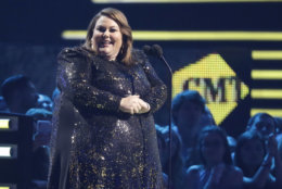 Chrissy Metz presents the male video of the year award at the CMT Music Awards at the Bridgestone Arena on Wednesday, June 6, 2018, in Nashville, Tenn. (AP Photo/Mark Humphrey)