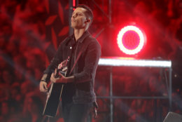 Devin Dawson performs "All On Me" at the CMT Music Awards at the Bridgestone Arena on Wednesday, June 6, 2018, in Nashville, Tenn. (AP Photo/Mark Humphrey)