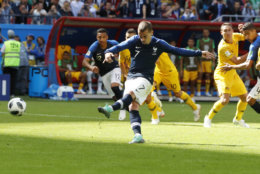 France's Antoine Griezmann scores the penalty goal during the group C match between France and Australia at the 2018 soccer World Cup in the Kazan Arena in Kazan, Russia, Saturday, June 16, 2018. (AP Photo/Darko Bandic)
