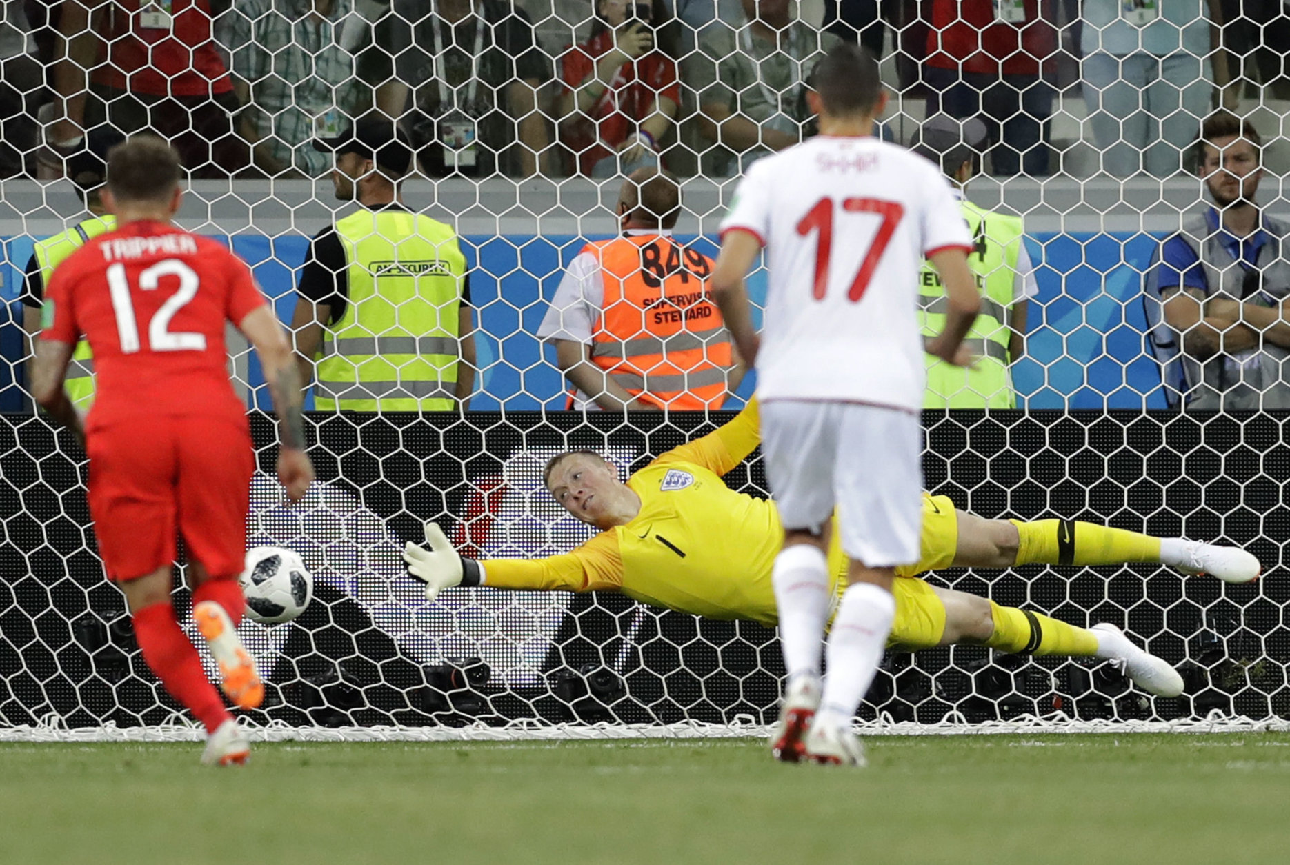 England goalkeeper Jordan Pickford, misses the ball during the group G match between Tunisia and England at the 2018 soccer World Cup in the Volgograd Arena in Volgograd, Russia, Monday, June 18, 2018. (AP Photo/Sergei Grits)