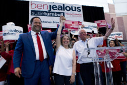 Democrat Ben Jealous, left, raises the hand of his running mate Susie Turnbull, while Sen. Bernie Sanders, I-Vt., waves during a gubernatorial campaign rally in Maryland's Democratic primary in downtown Silver Spring, Md., Monday, June 18, 2018. Sanders may not be endorsing his own son's congressional bid, but he rallied on a hot Monday night in Maryland to fire up voters for Jealous' campaign for governor. (AP Photo/Jose Luis Magana)