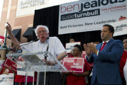 Sen. Bernie Sanders, I-Vt., accompanied by Democrat Ben Jealous, speaks to the crowd during a gubernatorial campaign rally in Maryland's Democratic primary at downtown Silver Spring, Md., Monday, June 18, 2018. (AP Photo/Jose Luis Magana)
