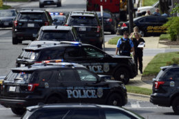 Police secure the scene of a shooting at the building housing The Capital Gazette newspaper in Annapolis, Md., Thursday, June 28, 2018. (AP Photo/Susan Walsh)