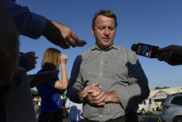 Annapolis Mayor Gavin Buckley speaks with reporters near the scene of a shooting in Annapolis, Md., Thursday, June 28, 2018. A gunman opened fire at a newspaper office in Annapolis on Thursday, killing several people and wounding several others before being taken into custody. (AP Photo/Susan Walsh)