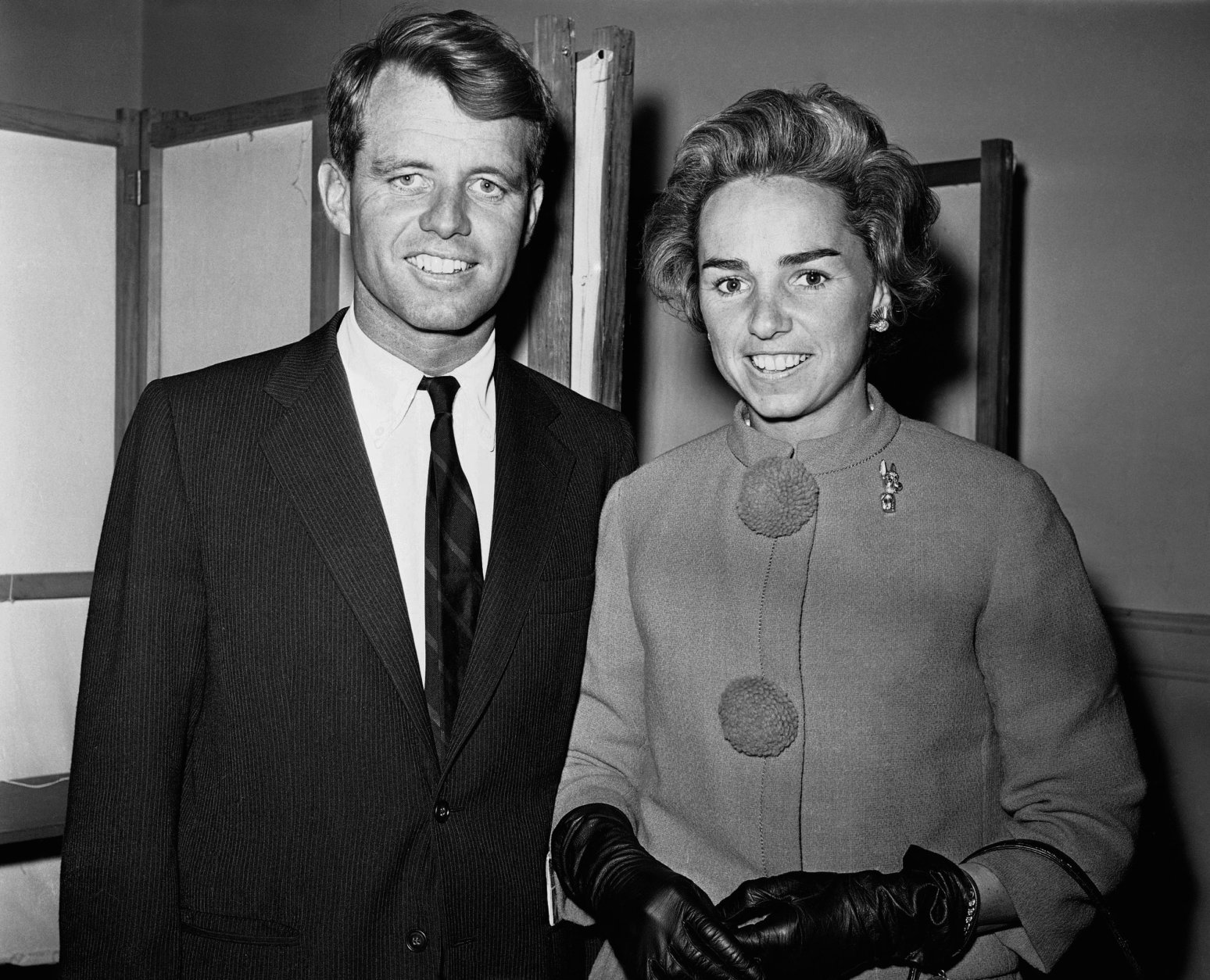 Robert F. Kennedy, brother of Sen. John F. Kennedy, is shown with his wife, Ethel, as they arrived to vote in the town of Barnstable, Mass., Nov. 8, 1960. (AP Photo)