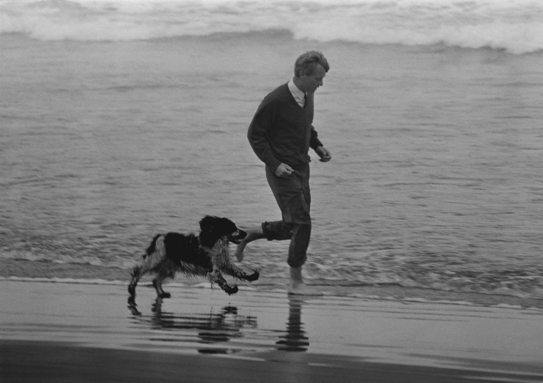 Democratic Sen. Robert F. Kennedy of New York runs through the surf with his dog, Freckles, during a stop in Astoria, Ore., May 24, 1968, during his  campaign for the presidential nomination.   Kennedy  was shot and killed by Sirhan Sirhan shortly after a California primary election victory speech on June 5, 1968, at the Los Angeles Ambassador Hotel. Bobby Kennedy served as campaign manager for his brother John F. Kennedy's successful presidential bid, and was later appointed by President Kennedy as U.S. Attorney General. (AP Photo/Barry Sweet)