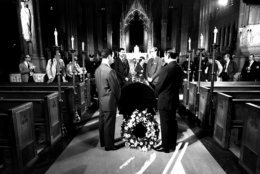 Two lines of mourners file past the casket of Sen. Robert F. Kennedy, D-N.Y., in New York City's St. Patrick's Cathedral the morning of June 7, 1968.  (AP Photo/stf)