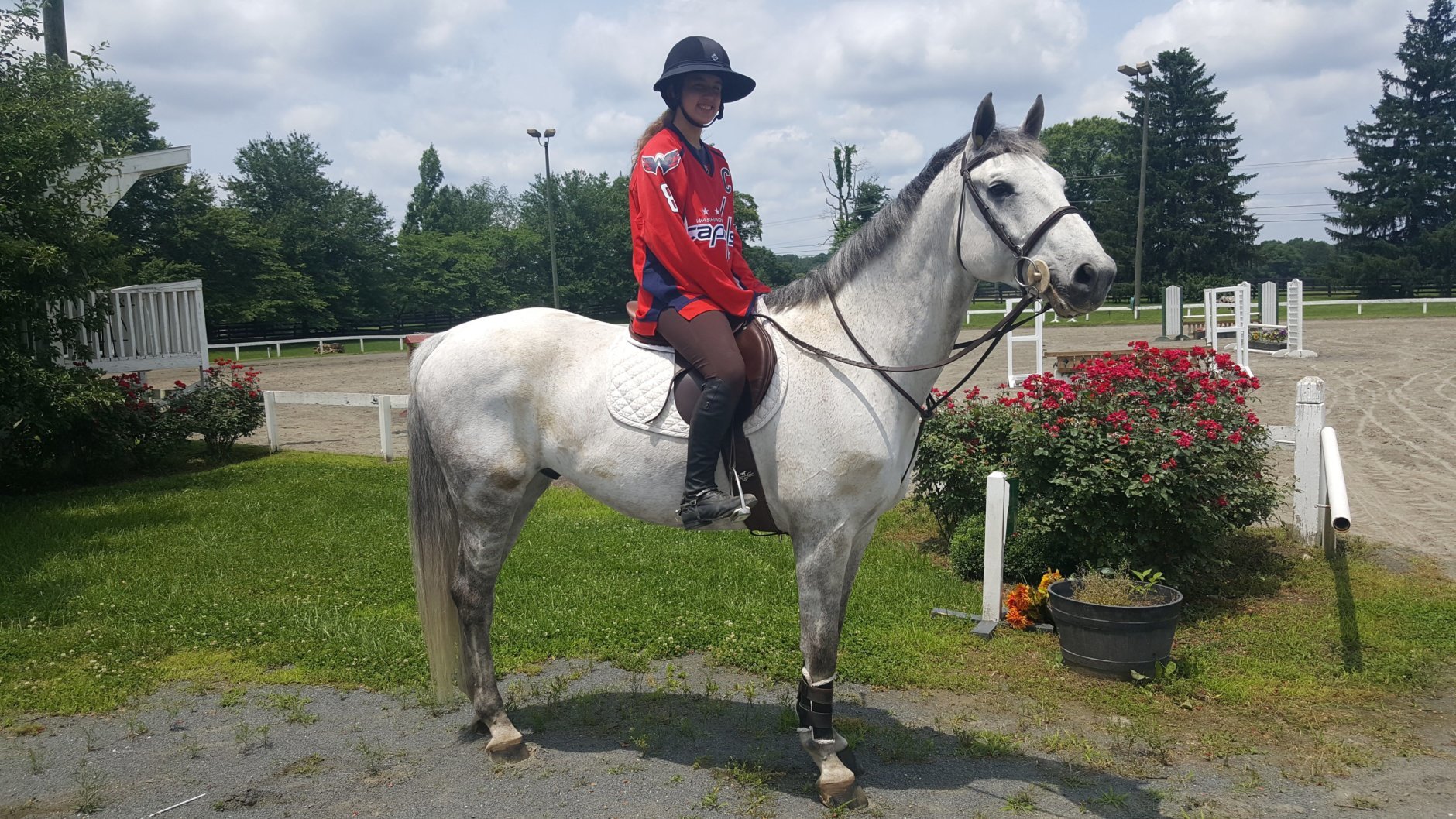 Granddad Bill Solis snapped a pic of his granddaughter, Kayla, and her horse, Cyrano, rocking the red. Bill is a self-described longtime Caps fan. (Courtesy Bill Solis)