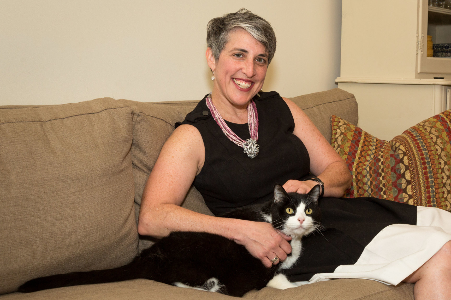 Council member Elissa Silverman lounges with Ousman the kitty. (Courtesy Humane Rescue Alliance)