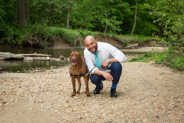 Council member Trayon White hits the trails with pup Rosco. (Courtesy Humane Rescue Alliance)