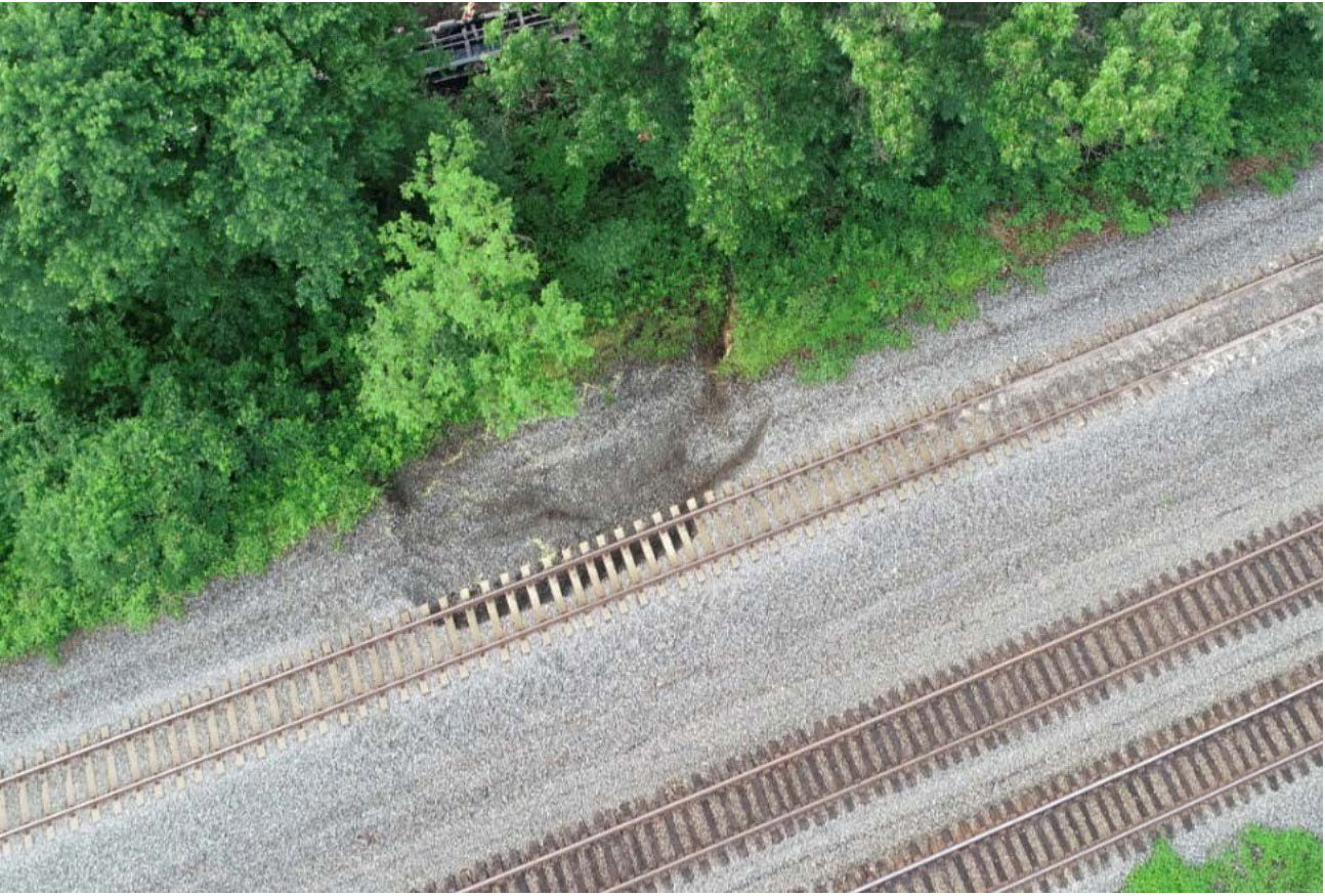 The rocks sat a foot and a half lower than they should have, and a mark on the rail showed that area was where cars slid off the tracks parallel to the Capital Beltway east of the Van Dorn Street Metro station. (Courtesy NTSB)