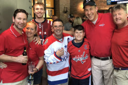 WTOP's Caitlin O’Connor shares a pic of Caps fans from Northern Virginia and Arizona, celebrating in the D.C. area. (WTOP/Caitlin O’Connor)