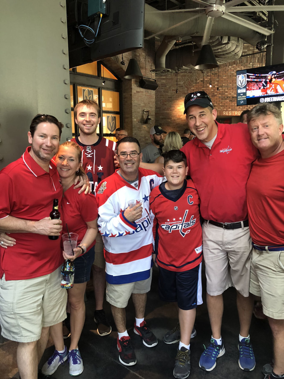WTOP's Caitlin O’Connor shares a pic of Caps fans from Northern Virginia and Arizona, celebrating in the D.C. area. (WTOP/Caitlin O’Connor)