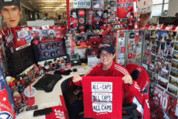 Amy Parker of Manassas, Virginia, goes all out for the Caps at work. "I have been a Caps fan since 2007 and fell so I love that I decided that I should be a fan 365 days of the year. I wear red everyday in some shape or form along with my Caps gear. There have been some painful moments but I am praying all the demons are banished tonight. Attached are pictures of my workspace which I call Caps-land. This is with total encouragement from my employer. Enjoy and LET’S GO CAPS!" (Photo courtesy Amy Parker)