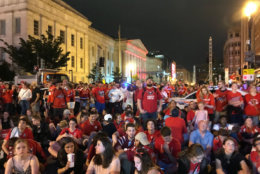 Fans gather outside in Northwest D.C. on Saturday, June 2, 2018, to watch Game 3 of the Stanley Cup final between the Washington Capitals and the Vegas Golden Knights. (WTOP/Dick Uliano)