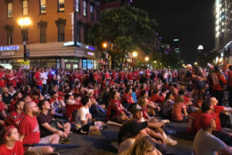 Fans gather outside in Northwest D.C. on Saturday, June 2, 2018, to watch Game 3 of the Stanley Cup final between the Washington Capitals and the Vegas Golden Knights. (WTOP/Dick Uliano)
