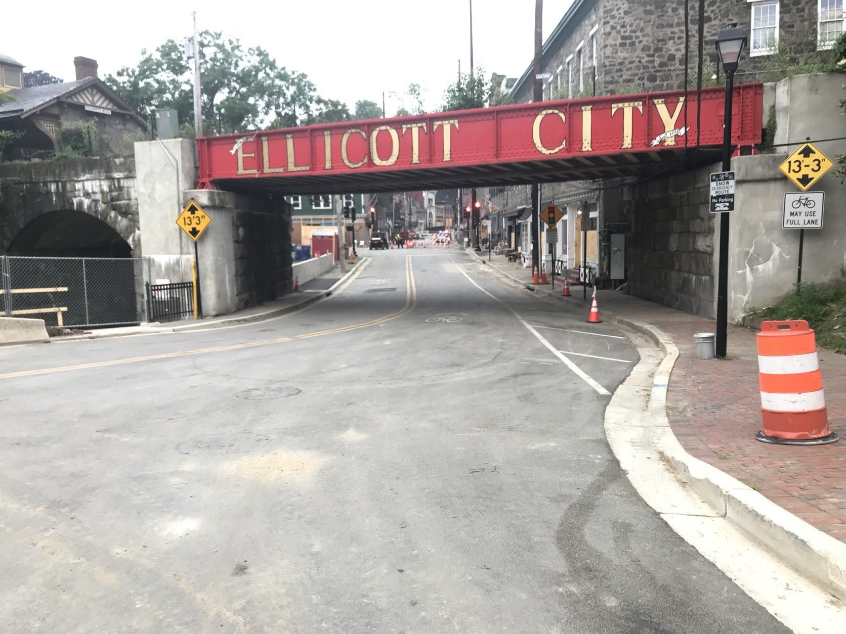 As of 6 a.m. on Tuesday, drivers could cross the Patapsco River bridge from Baltimore County onto Main Street in Ellicott City. Traffic must turn left after one block, on Maryland Ave, but this allows a cut-through. The no access zone remains, in the hardest-hit stretch of Main Street. (WTOP/Neal Augenstein) 