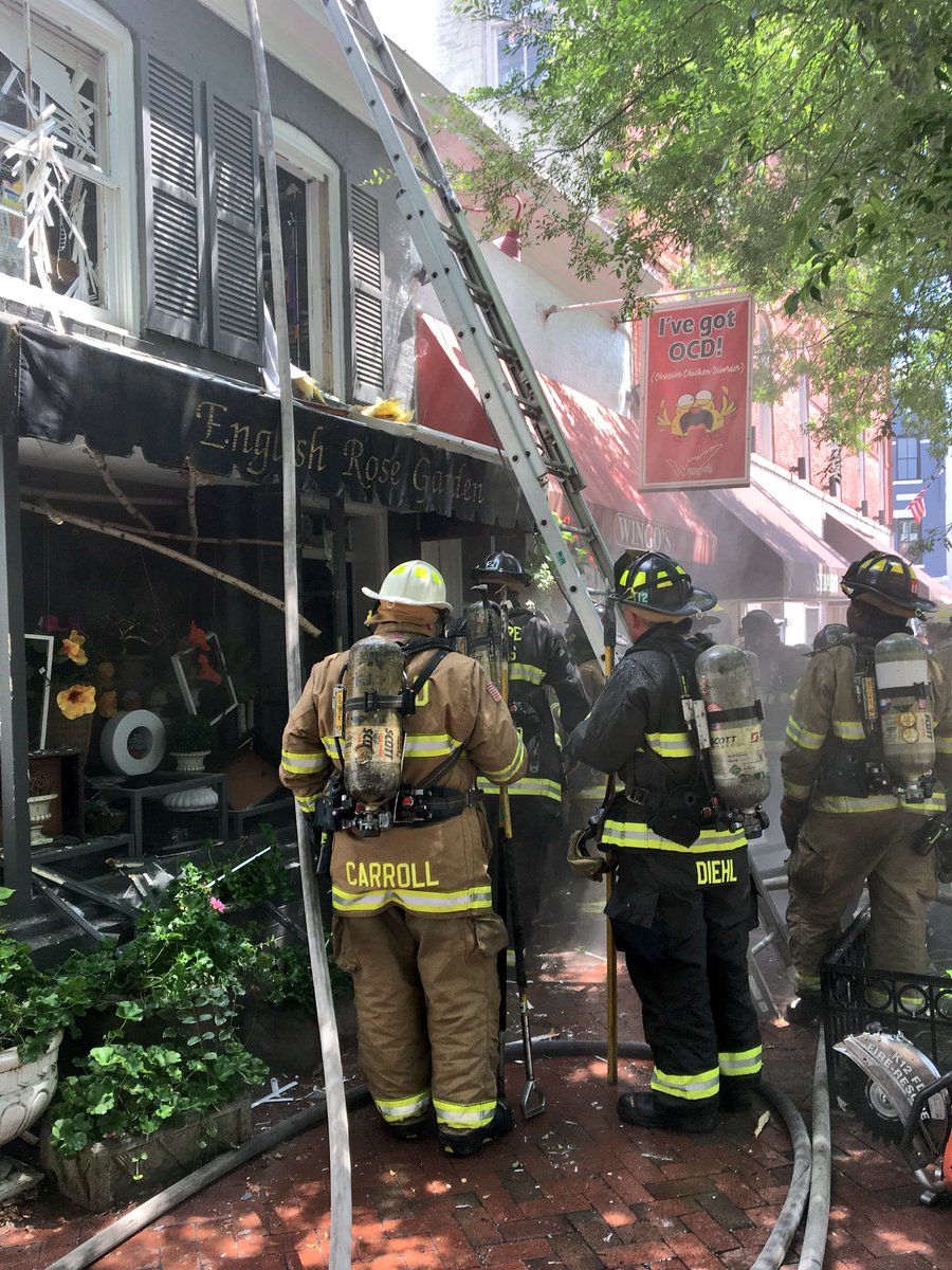 The 3200 block of O Street Northwest - Wingo's and the English Rose Garden - had fire in the walls and ceiling of the building, DC Fire and EMS tweeted. (Courtesy DC Fire and EMS)