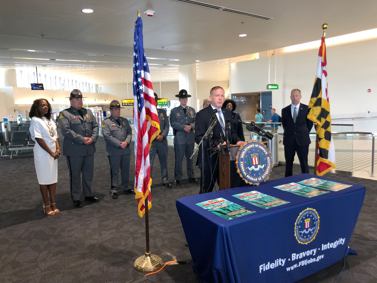 As part of an awareness campaign, the FBI is encouraging anyone who believes they’ve been assaulted to immediately tell a member of the flight crew so law enforcement can meet the aircraft at the gate. (WTOP/John Aaron)