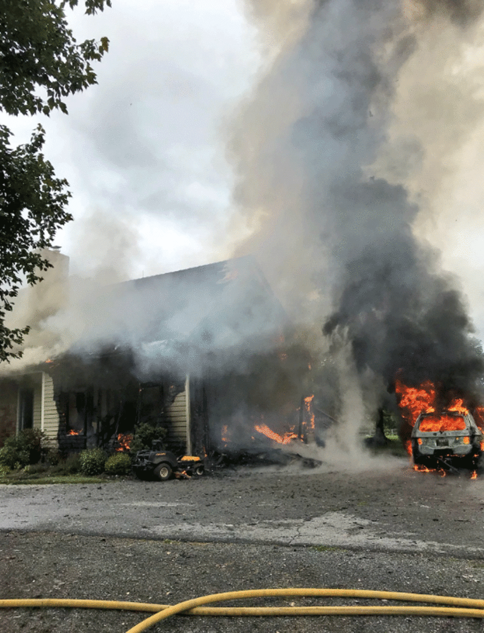 Montgomery County firefighters respond to a house in flames on Sugarland Road in Poolesville, Maryland, on June 11, 2018. (Courtesy, Montgomery County Fire and Rescue) 