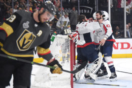 LAS VEGAS, NV - JUNE 07:  Braden Holtby #70 and Tom Wilson #43 of the Washington Capitals celebrate their 4-3 winto win the Stanley Cup as Reilly Smith #19 of the Vegas Golden Knights reacts in Game Five of the 2018 NHL Stanley Cup Final at T-Mobile Arena on June 7, 2018 in Las Vegas, Nevada.  (Photo by Harry How/Getty Images) *** Local Caption *** Reilly Smith; Braden Holtby; Tom Wilson
